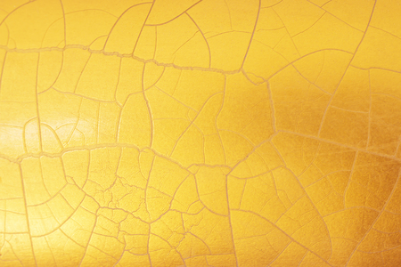 Gold background or textures and shadows, old walls and scratchesの写真素材