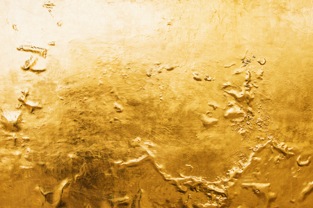 Gold background or textures and shadows, old walls and scratchesの写真素材
