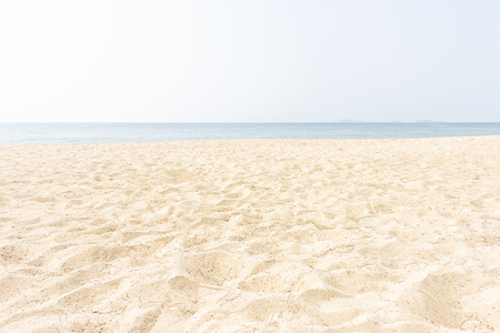 beautiful sand beach  free space with blue skyの写真素材