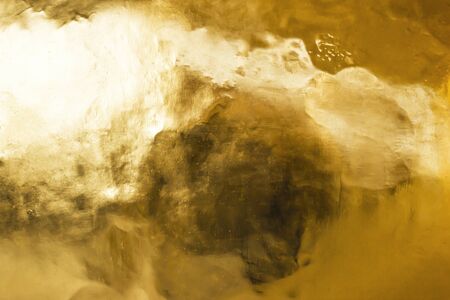 Gold background or textures and shadows, old walls and scratchesの写真素材