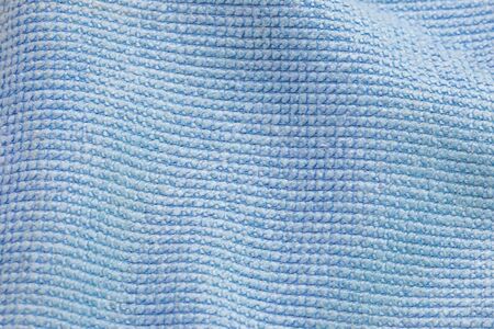 Close up of  blue wave microfiber fabric texture with copy-space