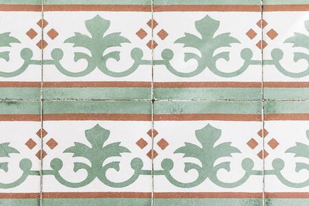 Colorful Vintage Old Ceramic Tiles.Patterned floor tiles Green, orange, whiteの写真素材