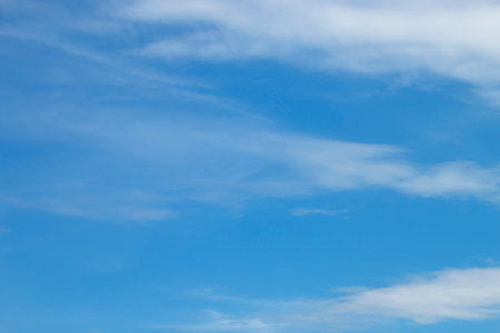 The sky was clear with some white cloudsの写真素材
