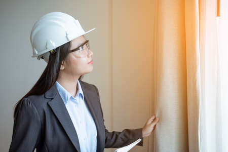 Portrait asia woman engineer working at construction siteの写真素材