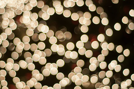 Christmas sparkling lights background. Defocused lights background. Bokeh blurred lights. Abstract...