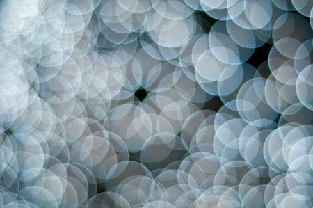 Christmas blurred lights background. Defocused lights background. Bokeh sparkling lights. Abstract circles background.の写真素材