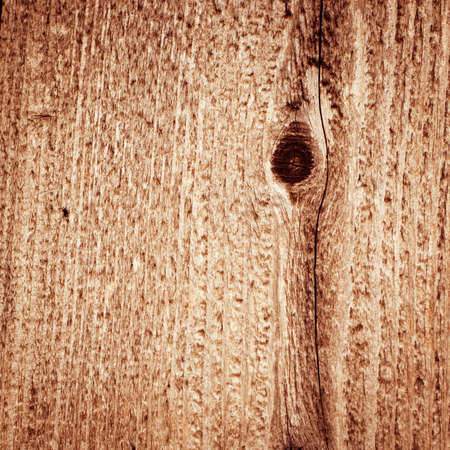 wood texture background. closeup of old wood board with knotsの写真素材