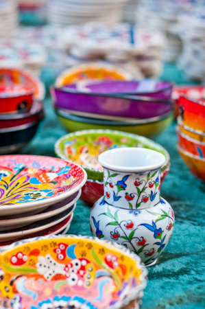 Colorful pottery bowls and dishes. Handmade folk art.の写真素材