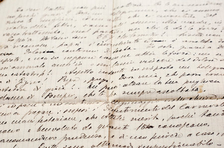 elegant cursive script. handwritten letter on old paper. vintage backgroundの写真素材