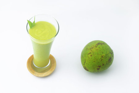 Closeup photo of Green avocado juice is very thick and delicious. Isolated white background