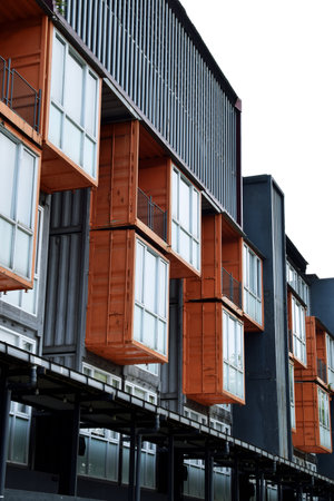 The industrial-themed container hotel building with a sky background is in the city of Batu, Malangの写真素材