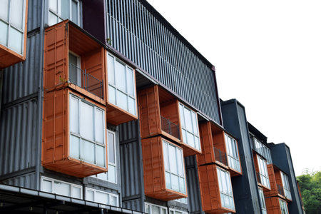 The industrial-themed container hotel building with a sky background is in the city of Batu, Malangの写真素材