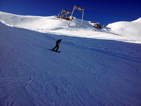Zugspitze one person snowboarding in area in Alps at winterの写真素材
