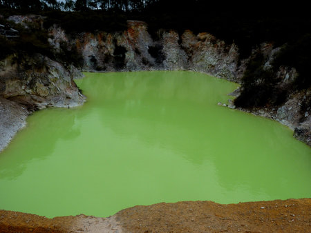 landscape of hot geotermal area with colored water and mud in Rotorua , New Zealandの写真素材