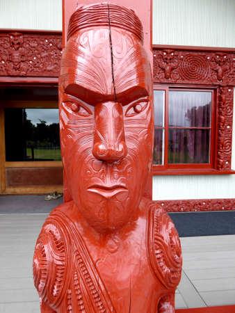 Close up of Traditional Maori Wooden carved sculpture in new zealandの写真素材
