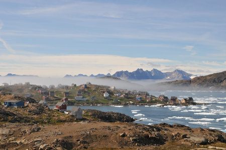 Long shot of Kulusuk town in east Greenlandの写真素材