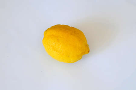 Healthy yellow lemon on white backgroundの写真素材