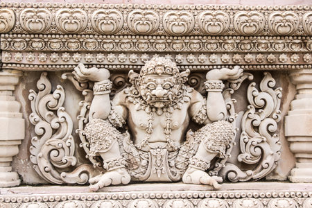 Thai molding art on the wall at templeの写真素材