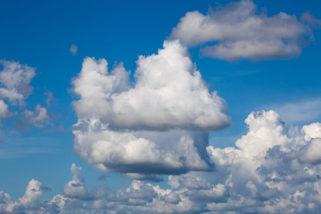 White clouds on blue sky background in sunny day summer time