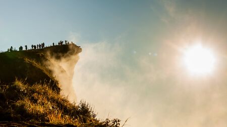 Sunrise with the peak of mountain and fog at Phu chi fa in Chiangrai,Thailandの写真素材