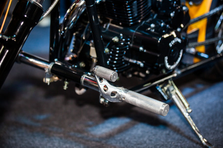 closeup of detail a motorcycle footrestの写真素材