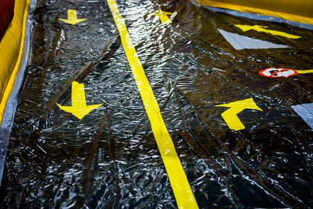 Driving school practice circuit area for children traffic at indoorsの写真素材