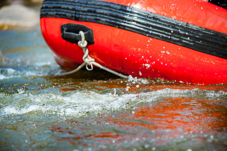 Close-up some part of raft with water rapids on the river, at travel attractionの写真素材