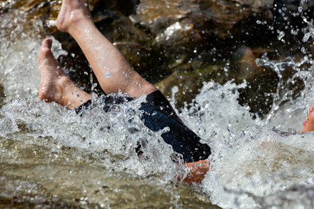 Young person are drowning in the riverの写真素材