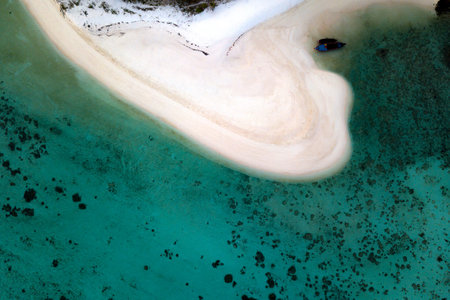 Aerial view or top view of beautiful curve beach with the emerald sea at Koh Lipe island in Satun,...
