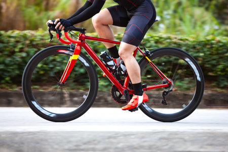 Fast motion of professional cyclist during the cycling race. Shot in side - Image