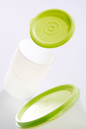 Plastic containers for food on a white background, close-up