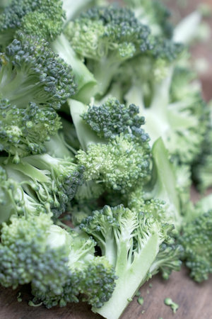 broccoli on a wooden table, healthy food, selective focus.の写真素材