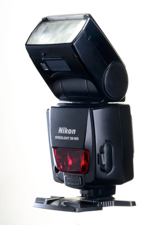 Camera flash on a white background. Studio lighting. Isolated.