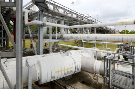 Oil refinery, petrochemical plant with tank and storage tanks.