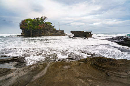 Tanah Lot, Bali, Indonesia - SEPTEMBER 16, 2020: One of Balis most visited sites completely empty on the islands most holy day shows the effect of the covid-19 pandemic on tourismのeditorial素材
