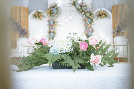 Wedding flower decoration with pink and white rosesの写真素材