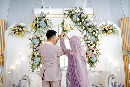 Beautiful bride and groom at the wedding ceremony. Bridegroom and bridegroom at a wedding.の写真素材