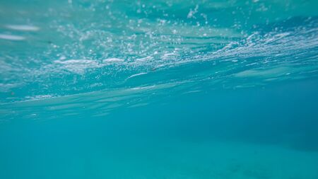 Panoramic scene under water and blue backgroundの写真素材