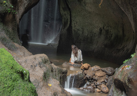 narrow way among the stones to reach the colors. の写真素材