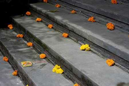 docoration everywhere, that's how ubud looks with little flowers, on the stears in the front of many temples around.の写真素材
