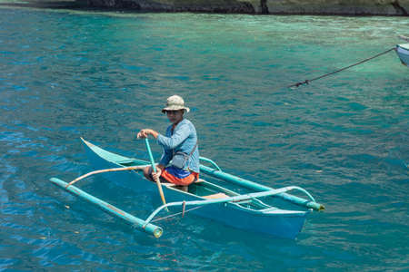 MAN ON BOAT, SCENE FROM PHILIPPINES, PALAWAN, 2019のeditorial素材