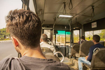 Man watching through the window, interior bus. Egypt 2018のeditorial素材