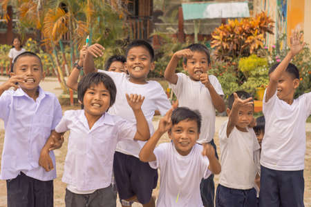Group of childrens enjoying playtime at shcool in Palawan, Port Barton, Philippines, 2019のeditorial素材