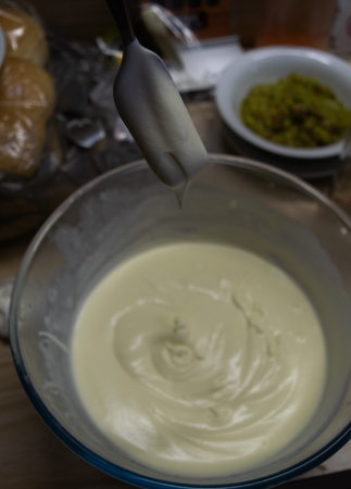 Home made whipped cream in a bol background