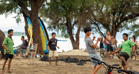 Indonesian guys playing football on the beach, Indonesia, Bali, Gili Island 2019のeditorial素材