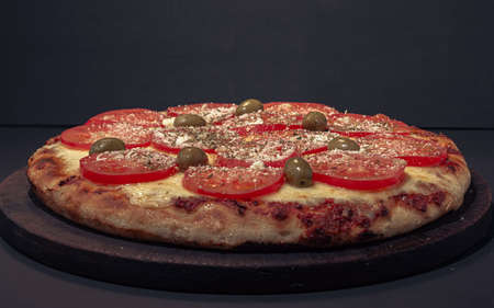 Home made Napolitana italian Pizza with cheese and tomate sauce.の写真素材