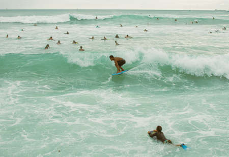 Editorial content from people surfing in Oahu, Honolulu, Hawai.のeditorial素材