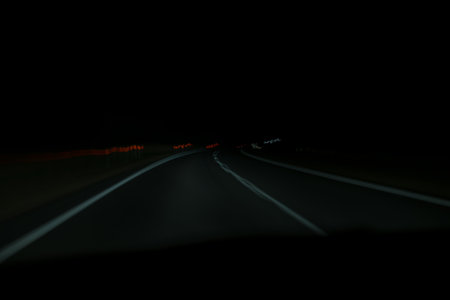 Abstract night road and velocity from a road trip, lights blur and shapesの写真素材