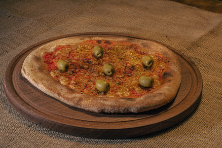 Home made cheese italian Pizza with tomate sauce and black backgroundの写真素材