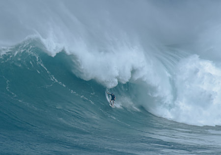 Sport photography. Jaws swell on International surfing event in Maui, Hawai 2021 December.のeditorial素材